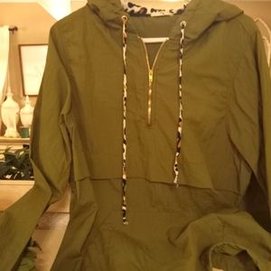 Women's lightweight pullover windbreaker. Hunter Green / Cheetah cinch waist